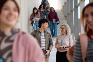 University student communicating with his professor