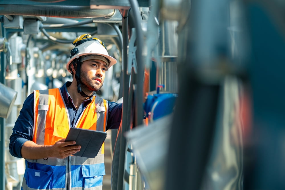 male engineer in safety uniform